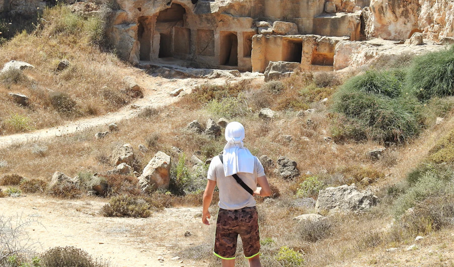 Hiker on a cliffside trail near Paphos, Cyprus